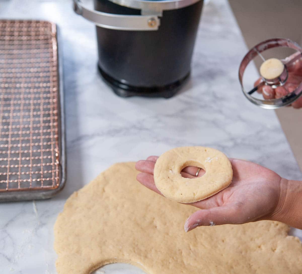 close up of donut cut from dough