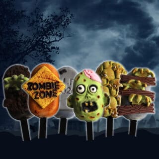 halloween-themed cakesicles that look like tombstones, zombies, skulls and hands