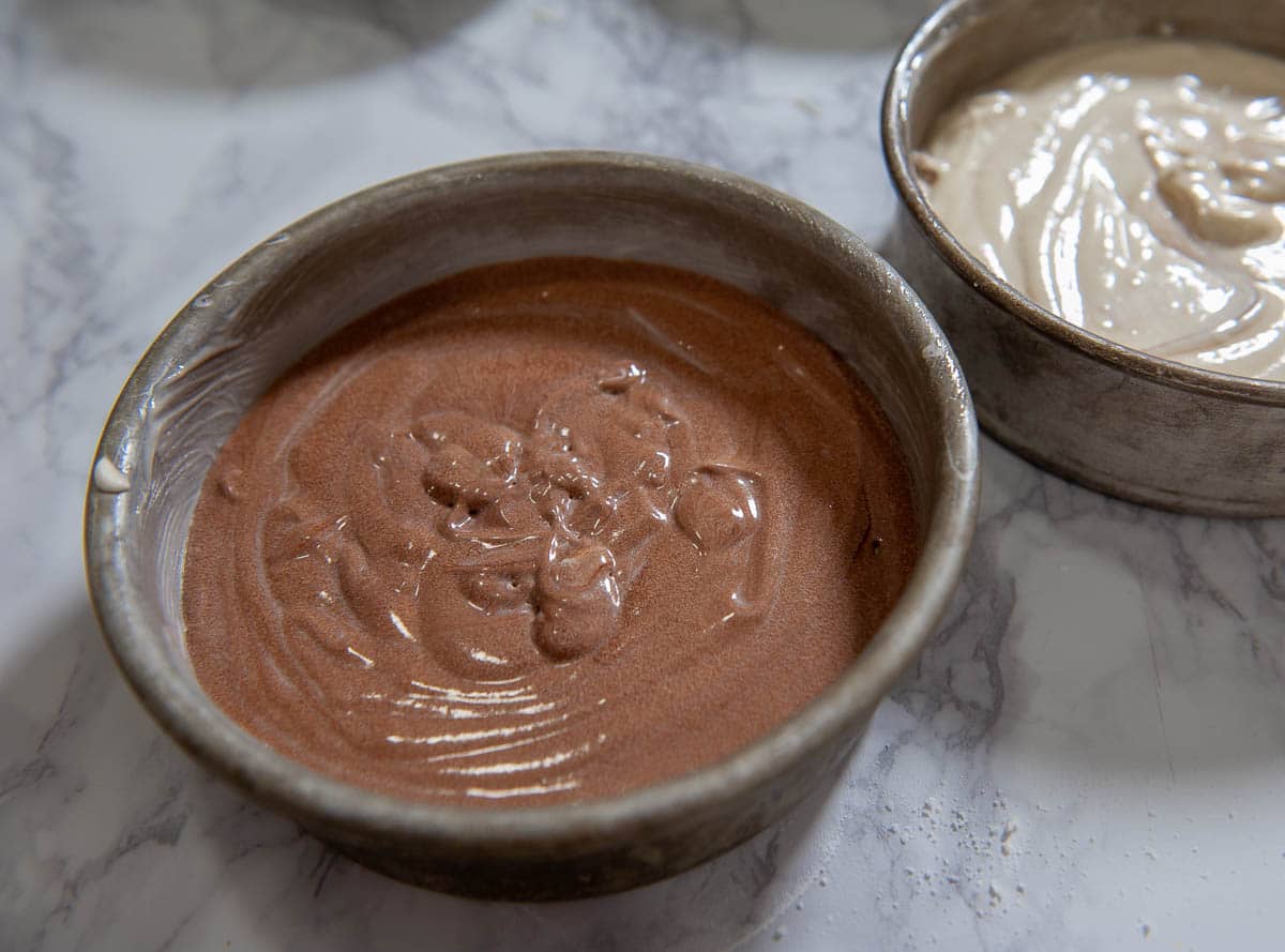 chocolate cake batter in a cake pan