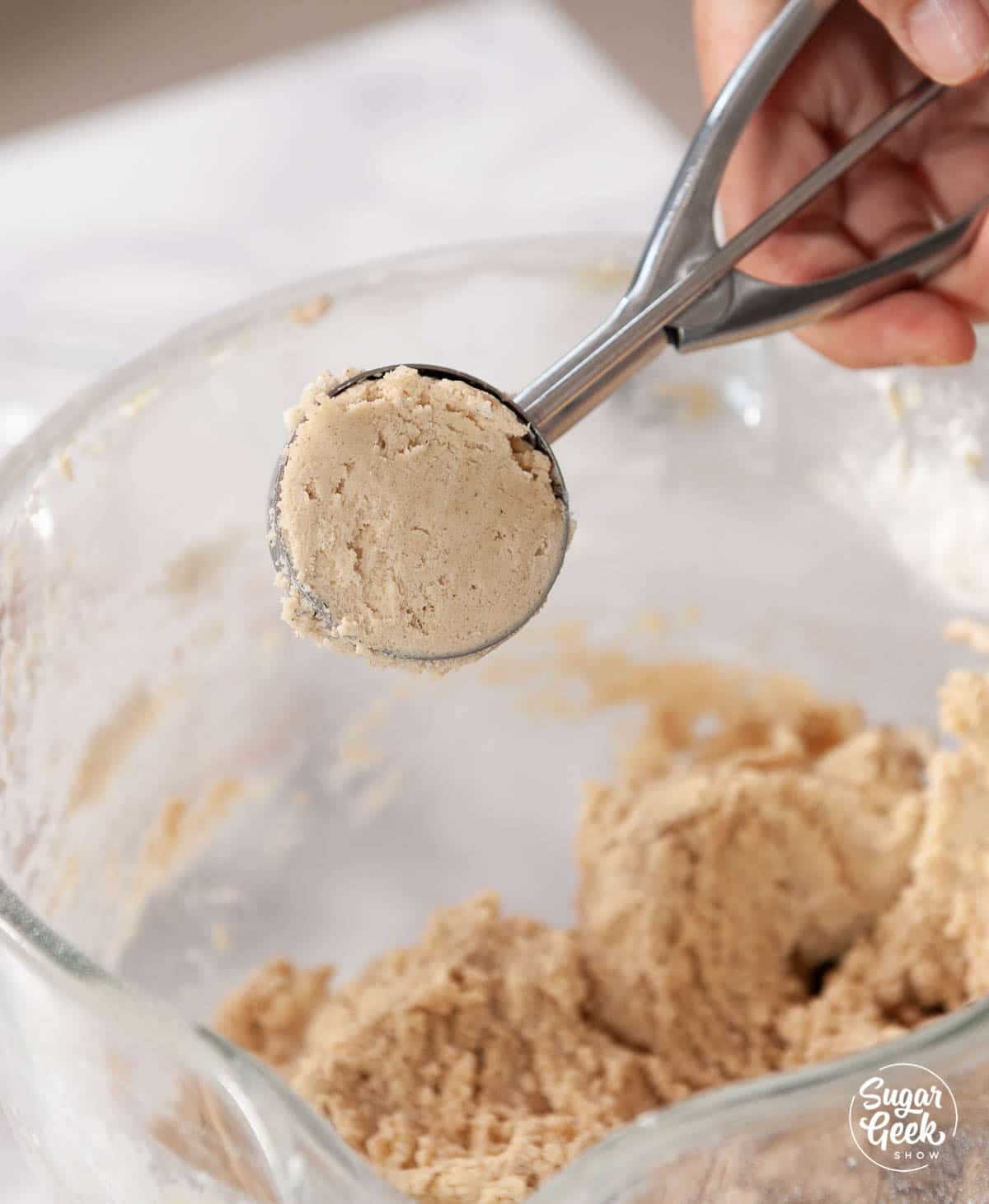 snickerdoodle dough in a cookie scoop