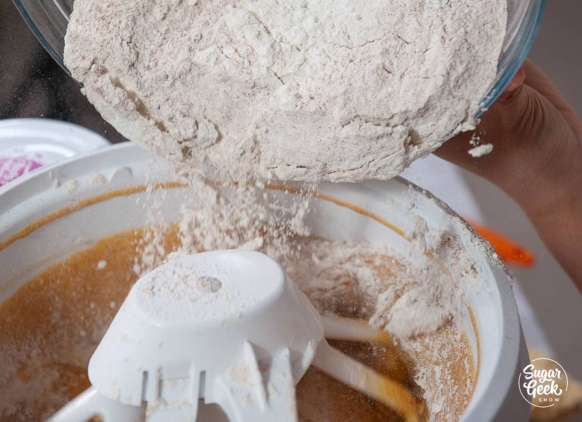 combining pumpkin spice cake ingredients