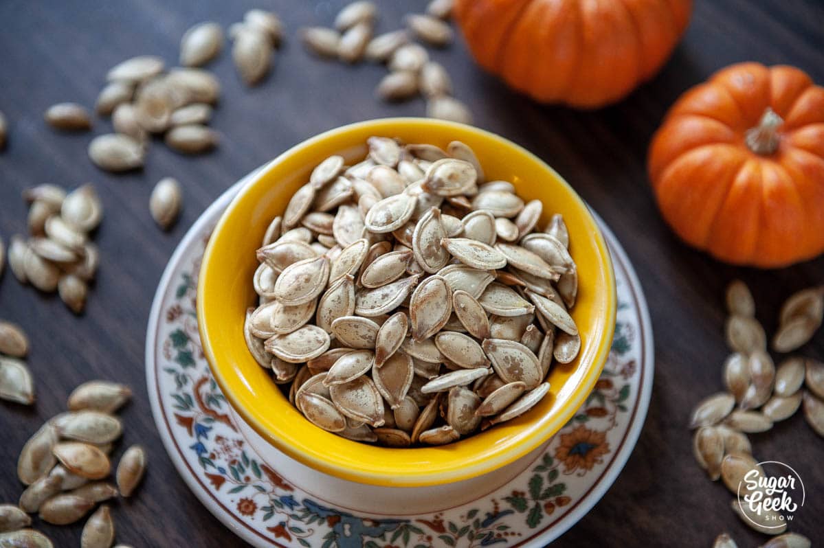 bowl of roasted pumpkin seeds in a bowl