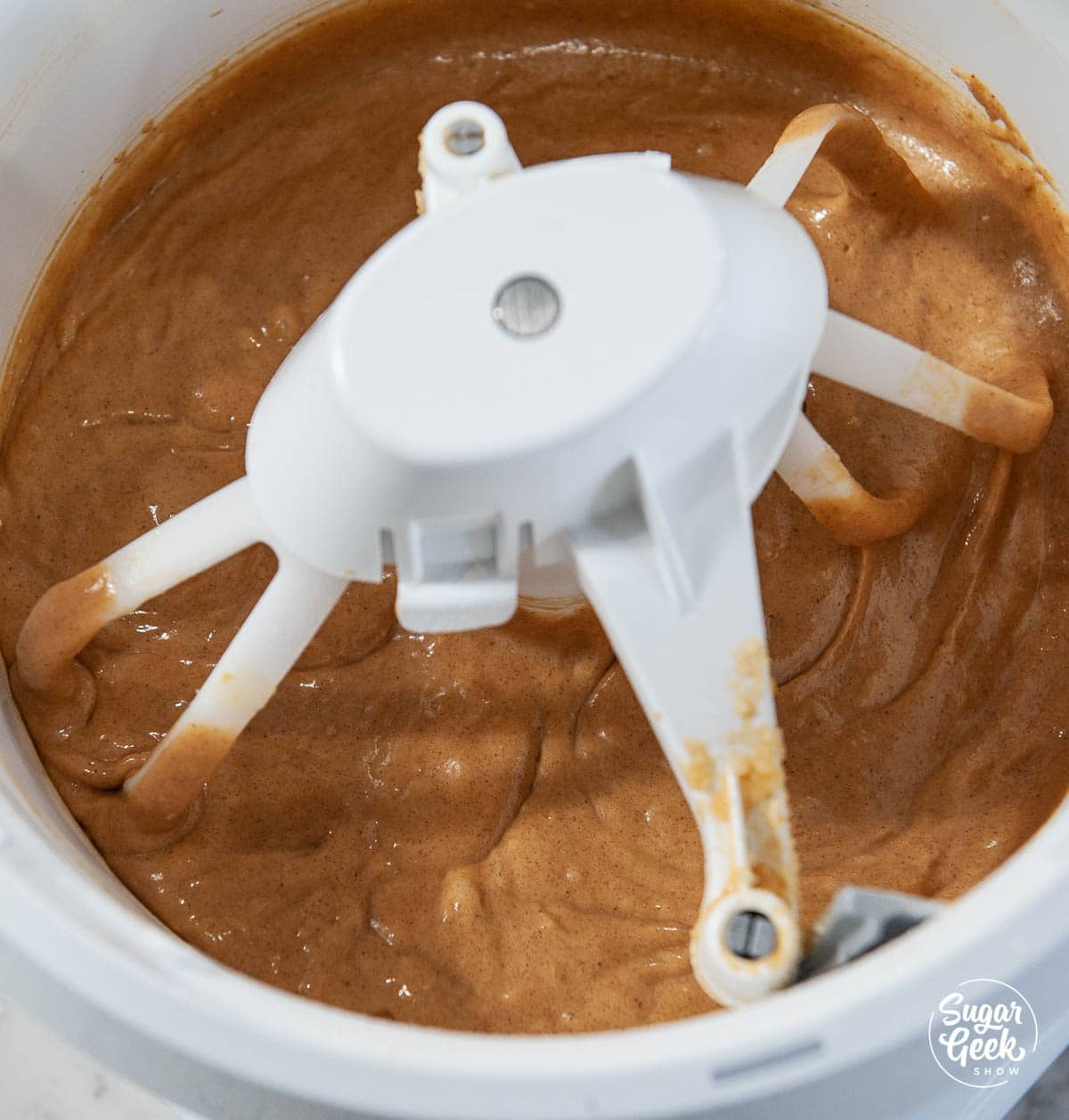 close up of gingerbread cake batter in a mixing bowl
