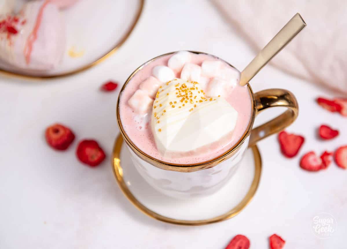 heart hot chocolate bomb in a white mug shot from above