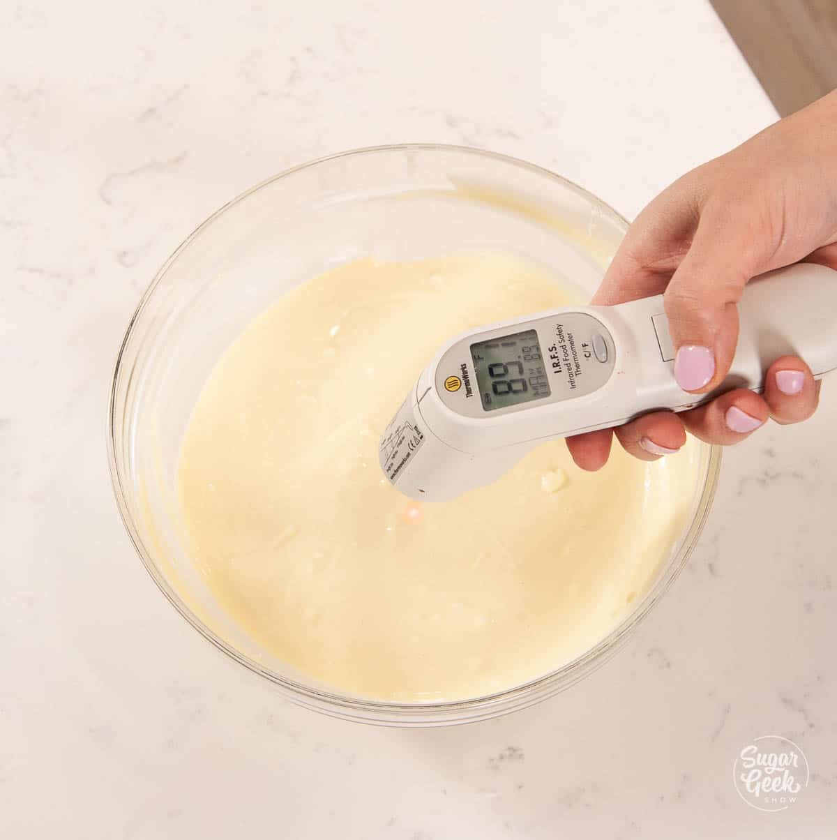 infrared thermometer above melted chocolate