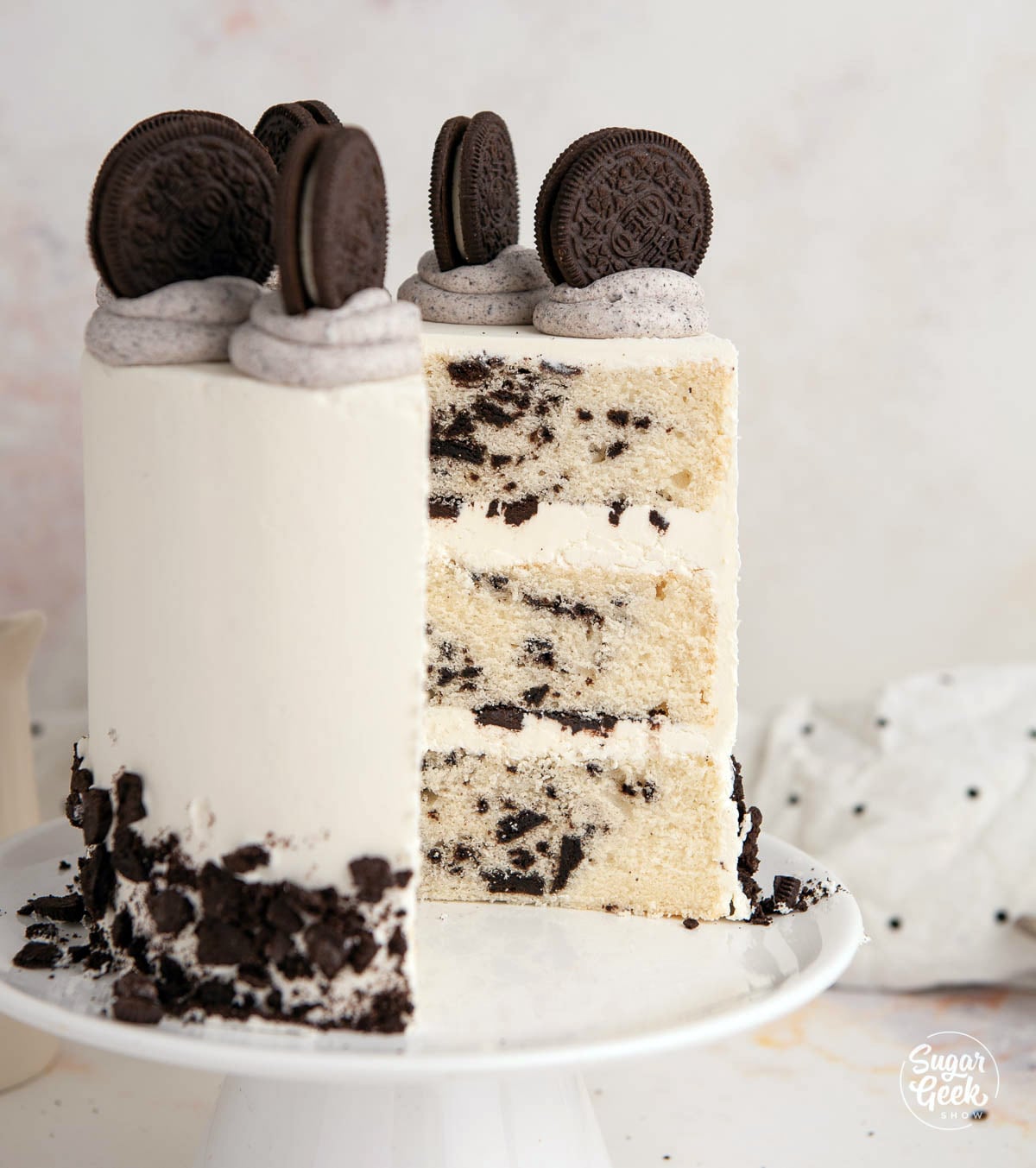 Closeup of oreo cake with a slice taken out of it