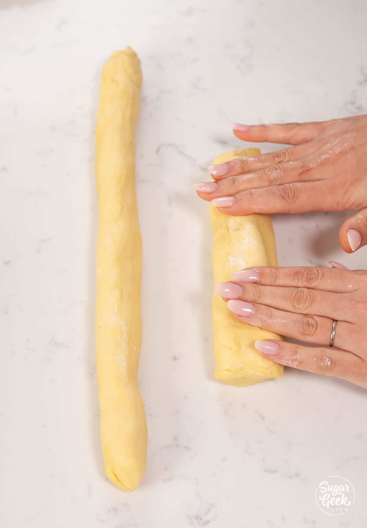 rolling brioche dough into long strands