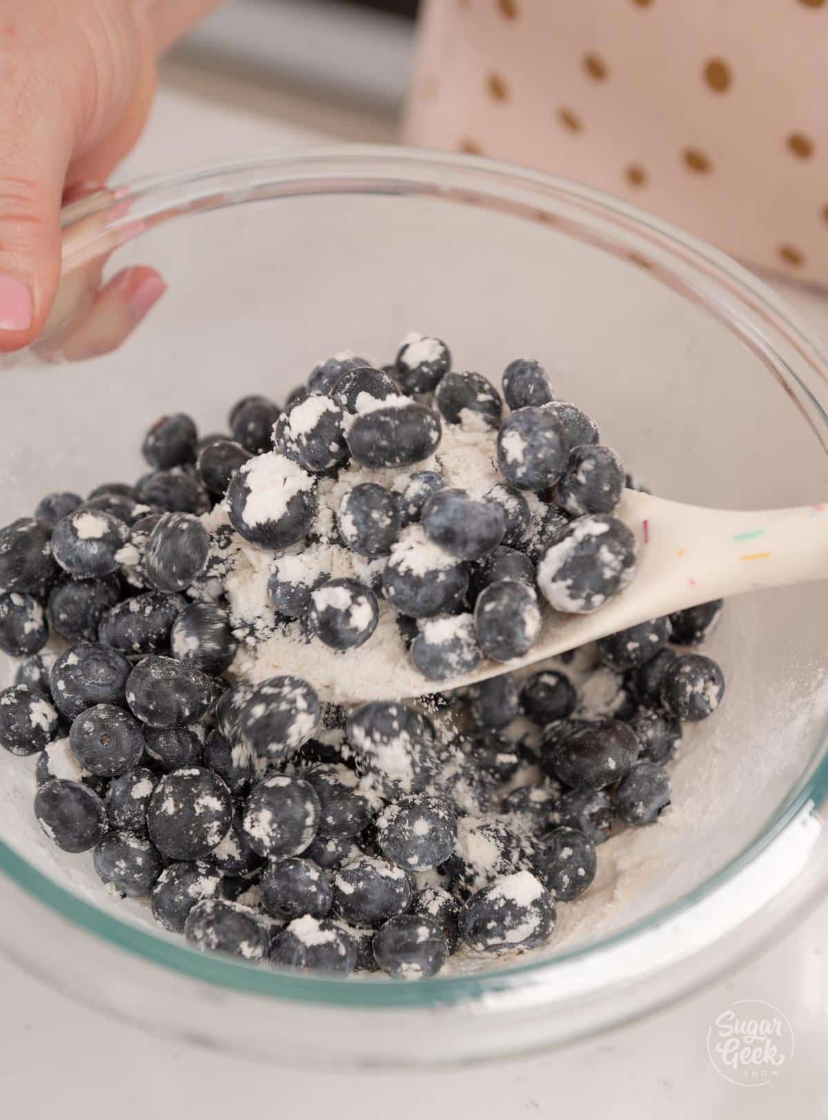 coating blueberries in flour