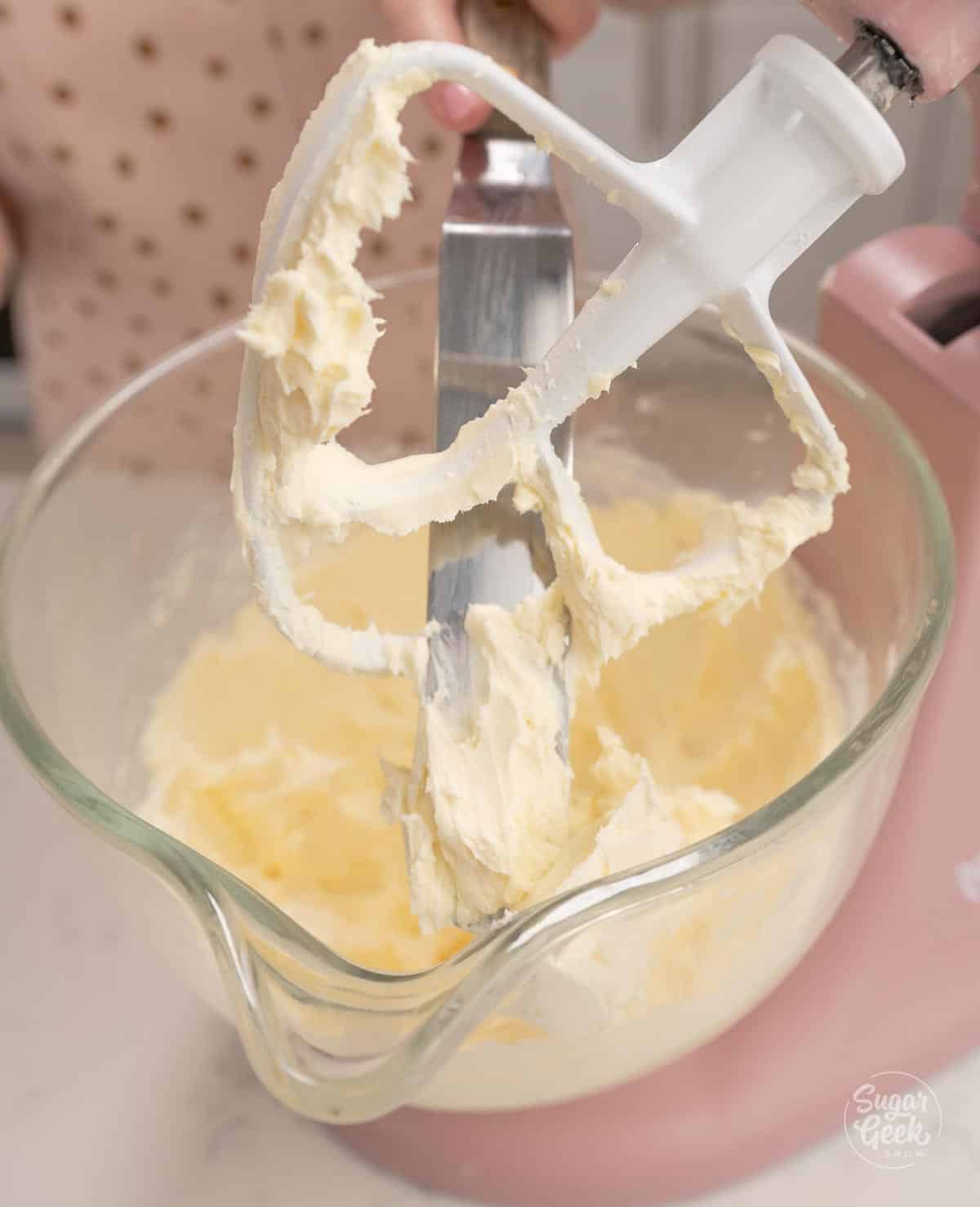 Cream cheese and butter creamed in a stand mixer with the paddle attachment.