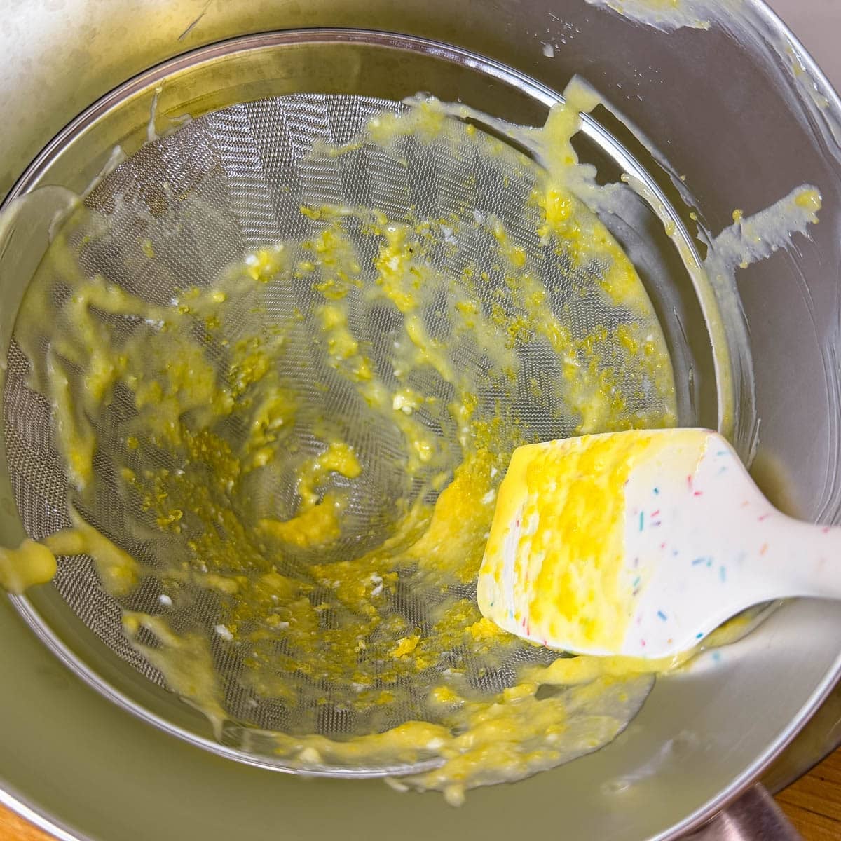 leftover lemon zest in a strainer