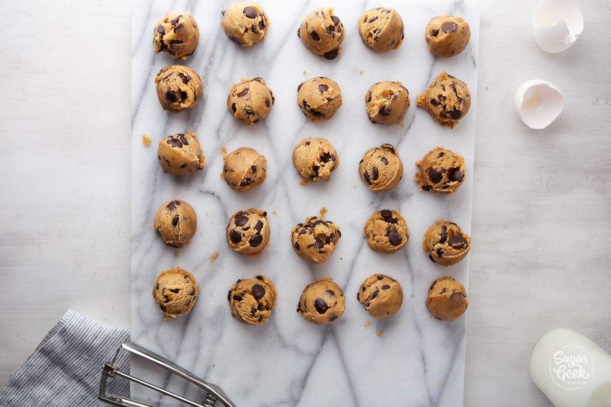 chocolate chip cookie dough balls on a white background