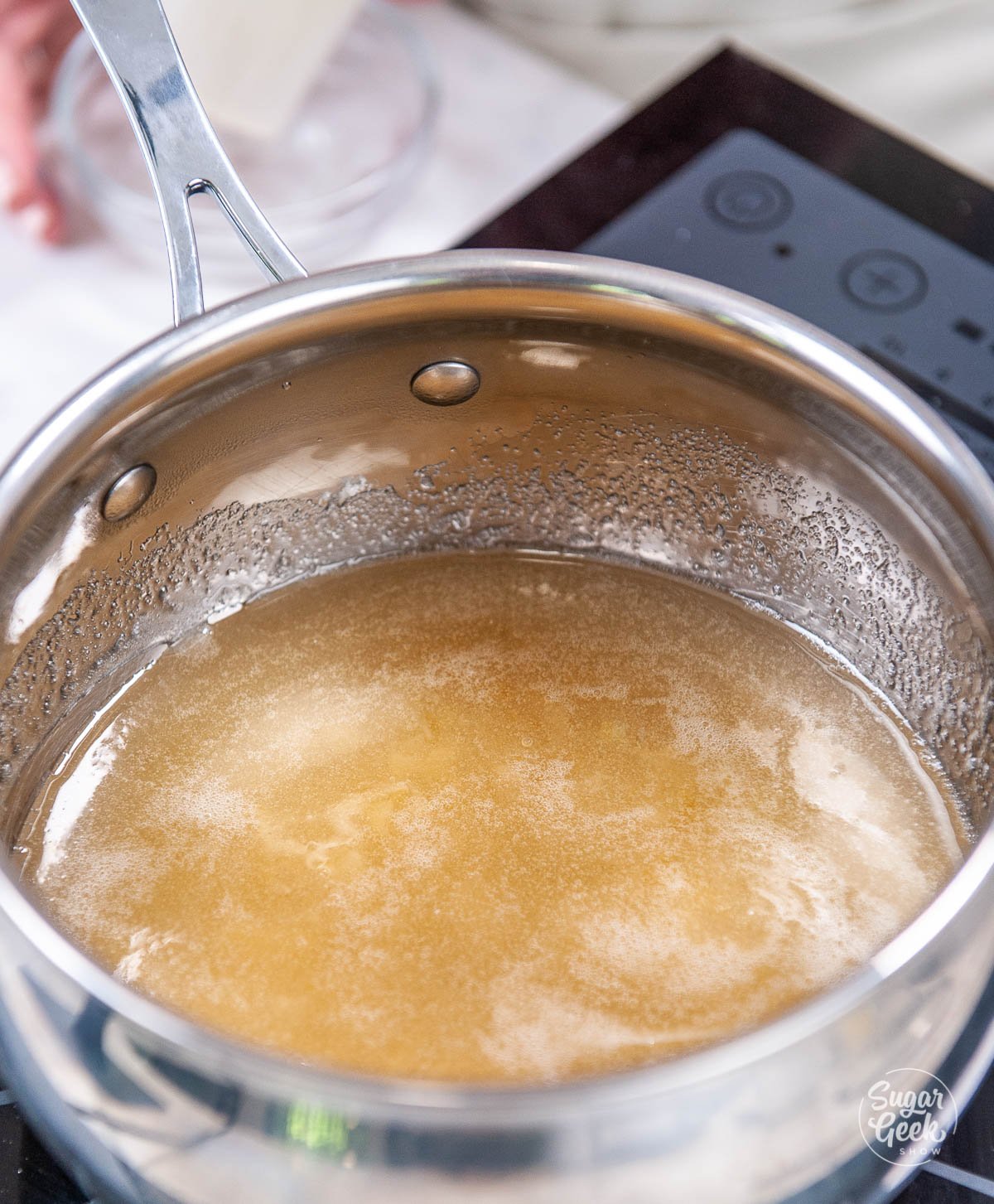 water, sugar, and corn syrup into a medium saucepan