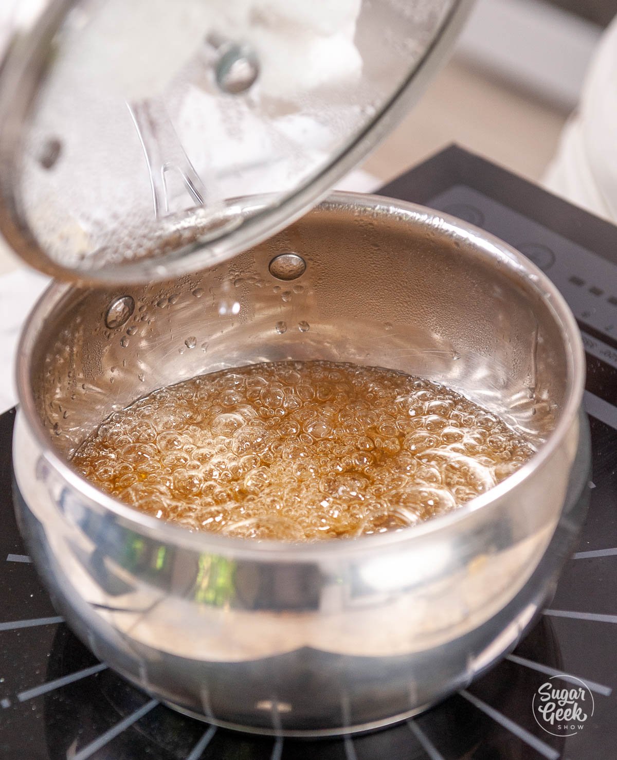 caramel sauce cooking in medium sauce pan