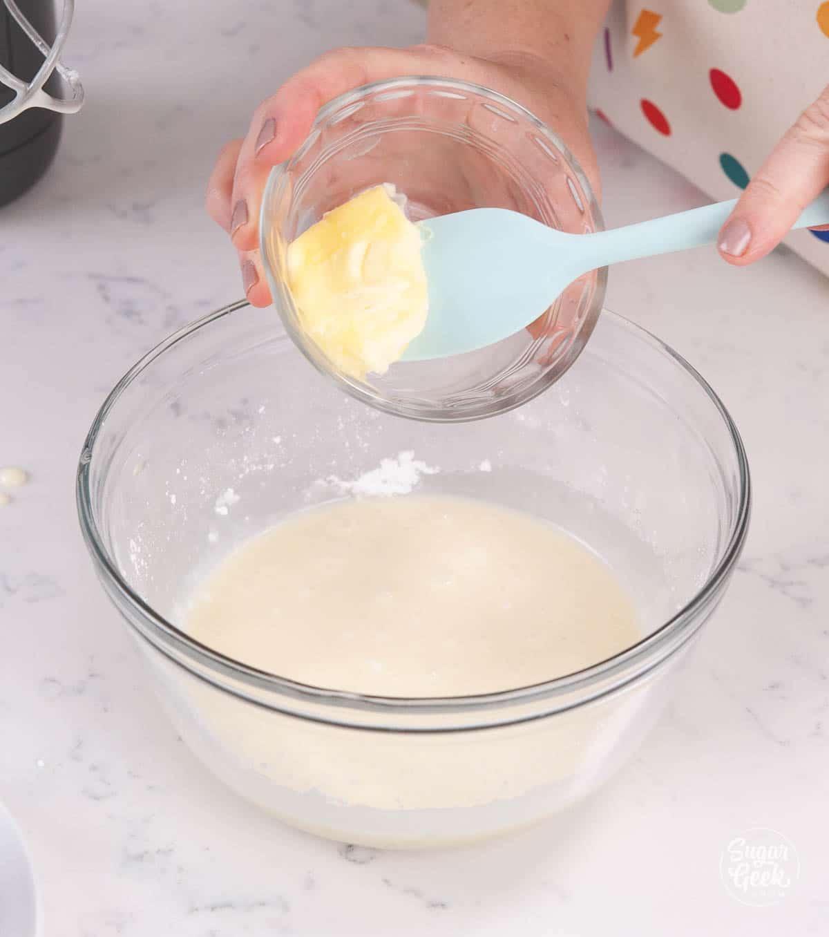 adding butter to lemon buttermilk glaze