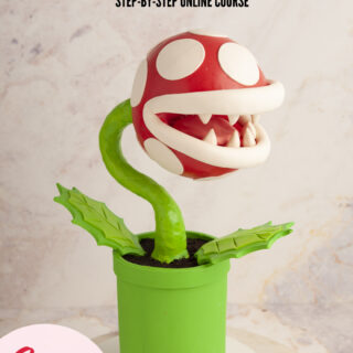 Cake sculpted to look like a piranha plant