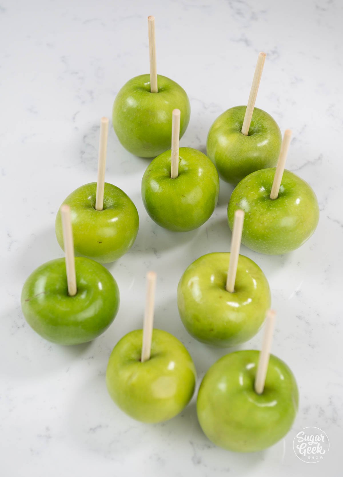 green apples with sticks inside