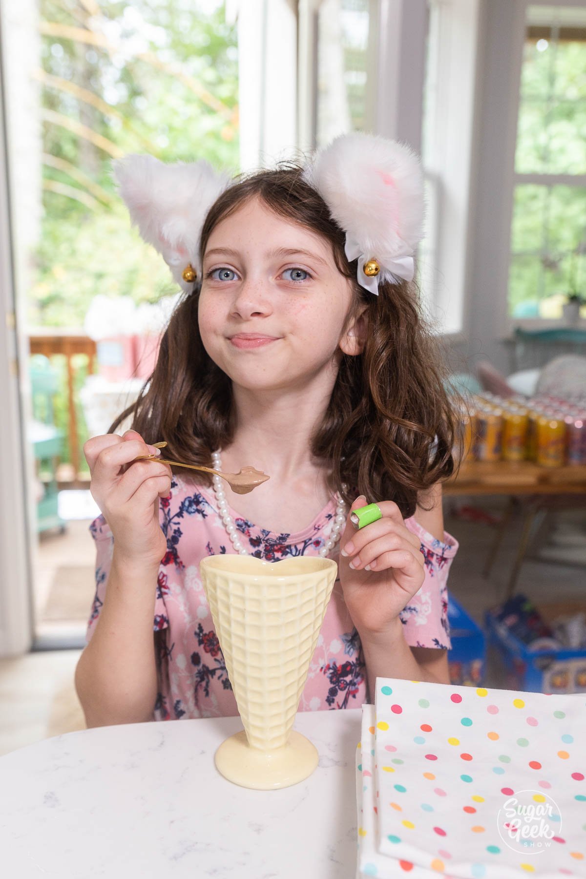 girl making ice cream sundae