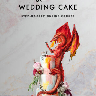 Cake sculpted to look like a realistic dragon on a wedding cake