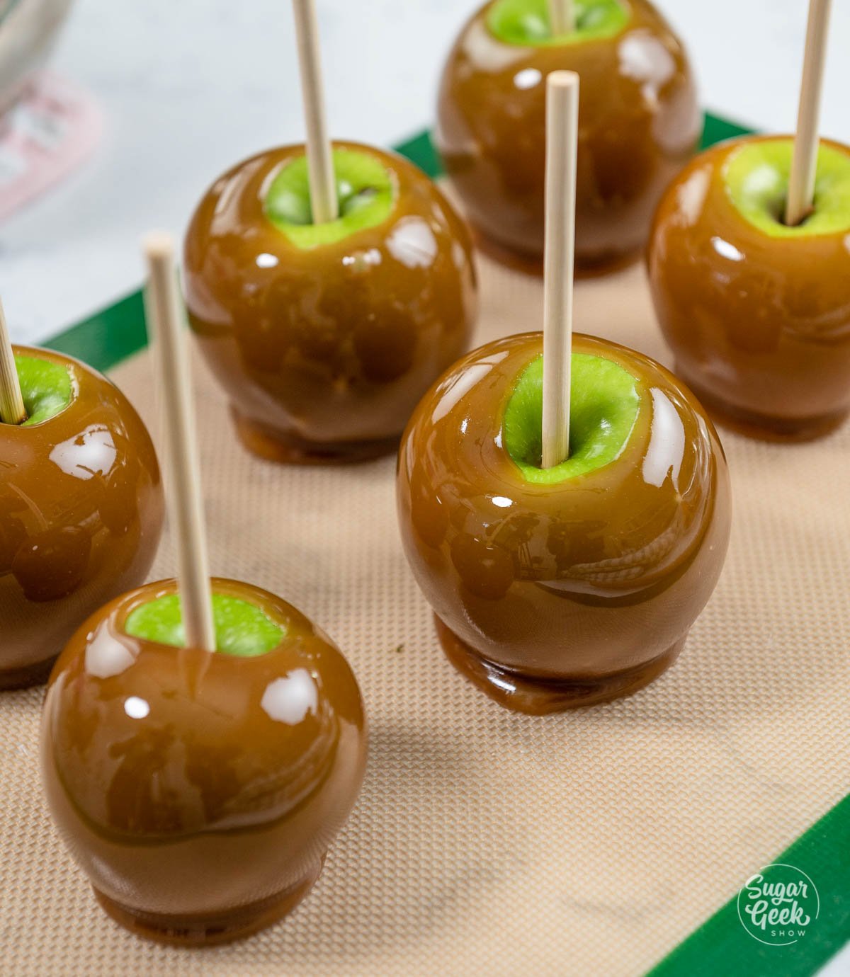 caramel apples on a silicone mat
