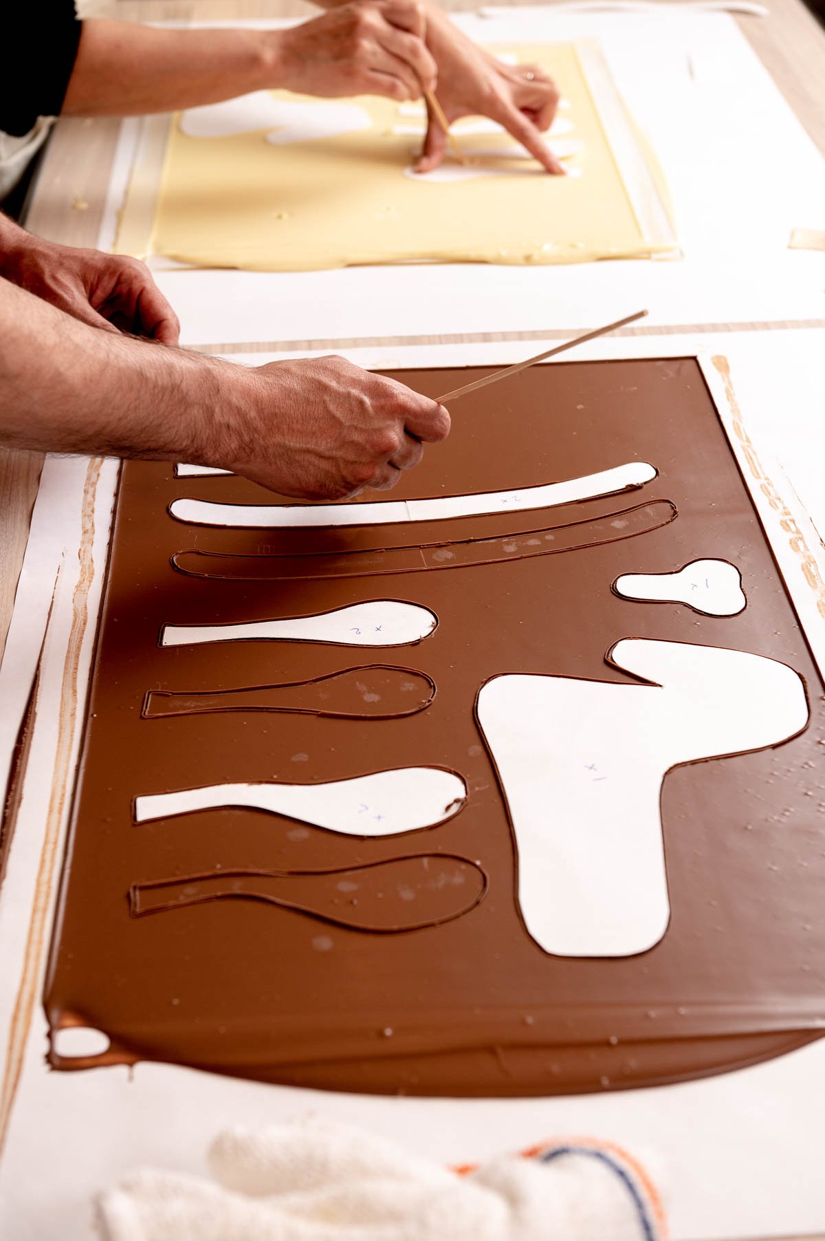 tracing chocolate horse onto tempered chocolate