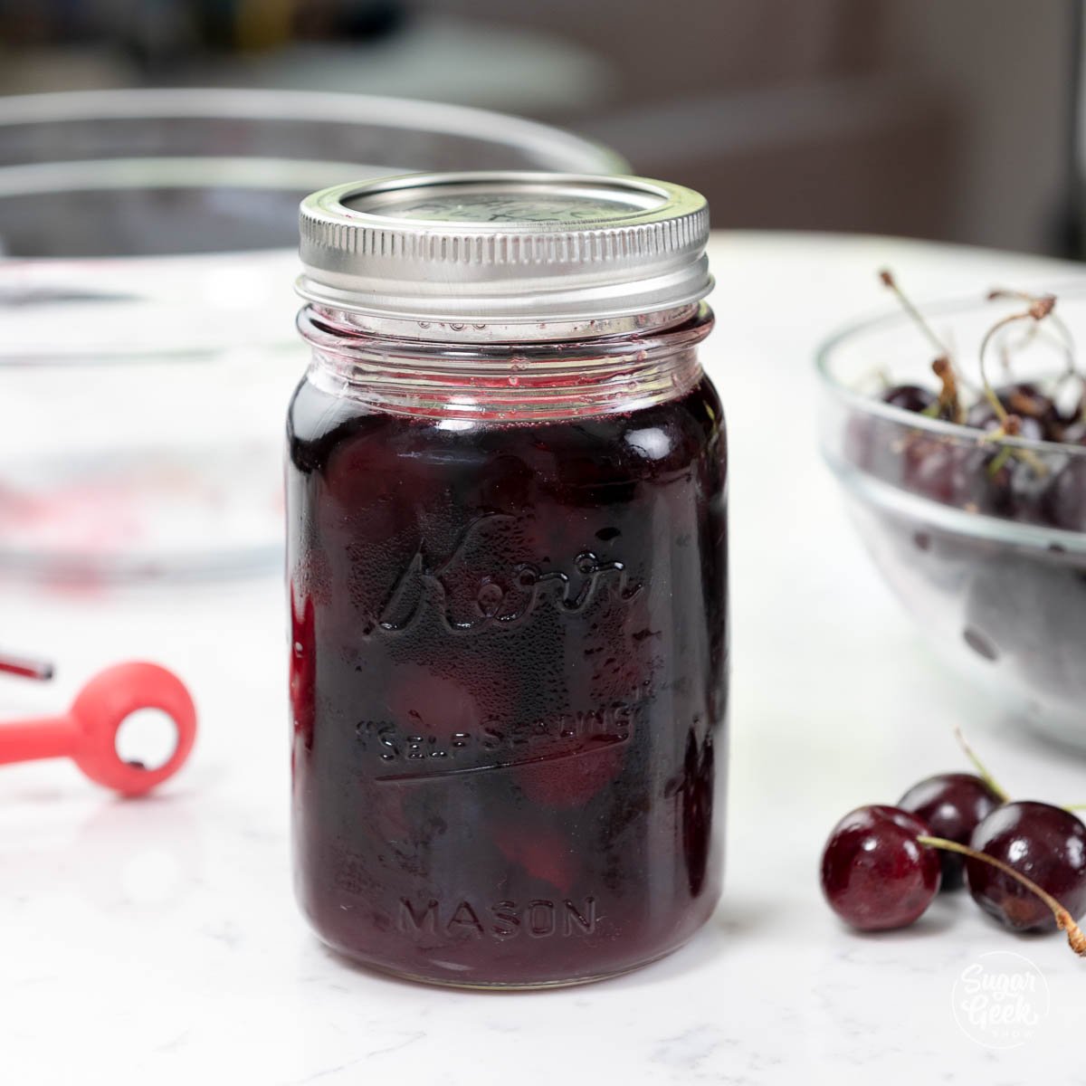 kirsch soaked cherries in a mason jar