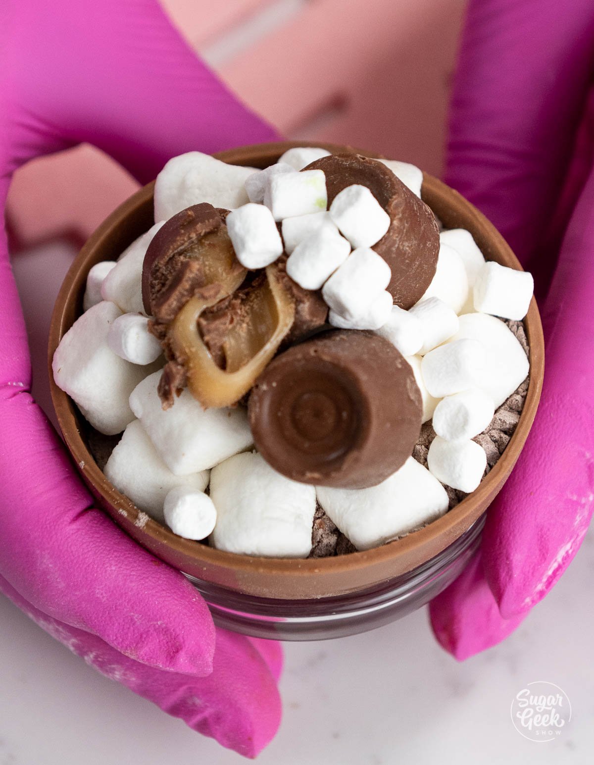 hot chocolate bomb shell filled with marshmallows and candy