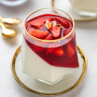 close up of panna cotta with strawberry gelee