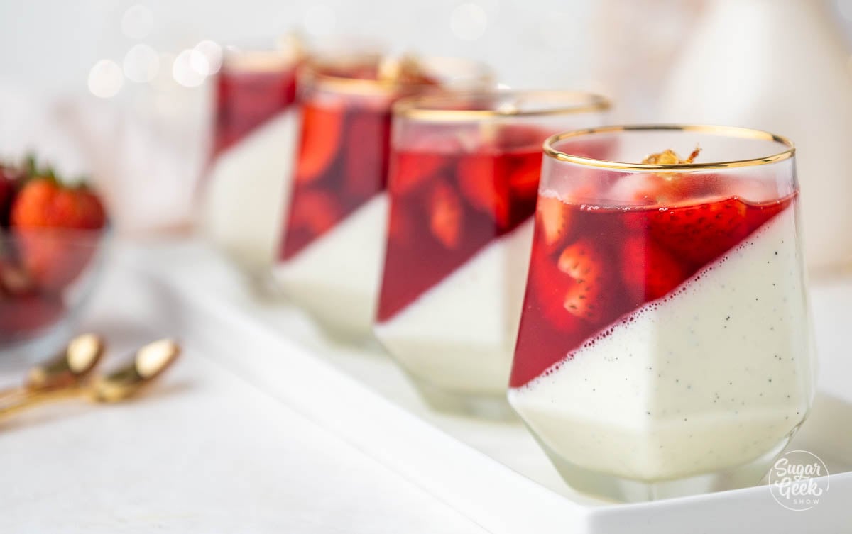 dessert plate presentation of panna cotta with strawberry