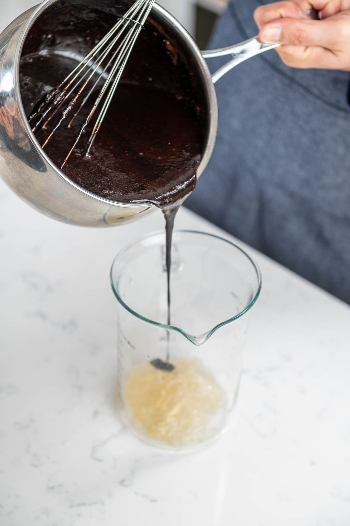 pouring chocolate into pitcher