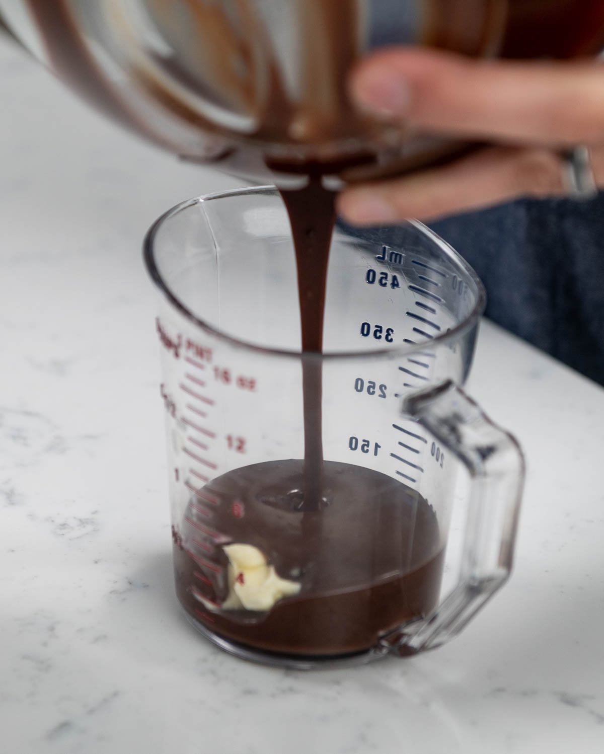 pouring chocolate into pitcher