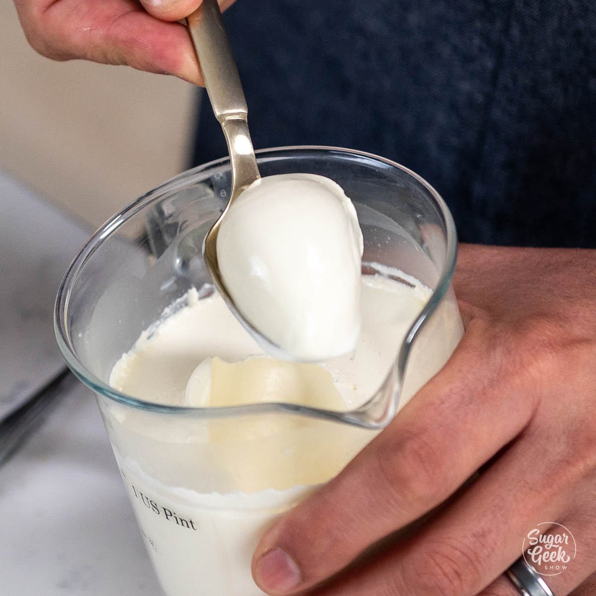 scooping creme fraiche from container