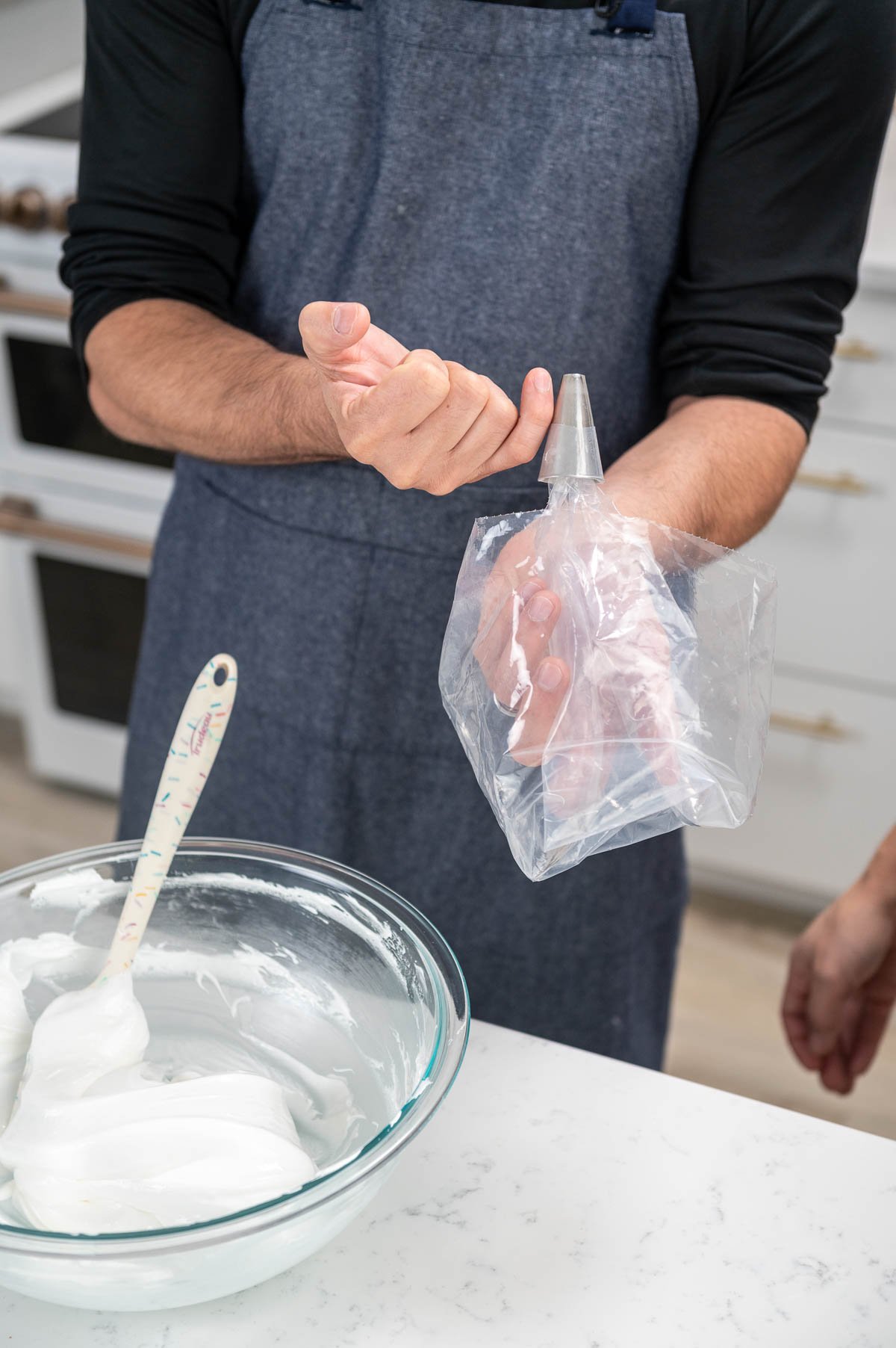 hand holding a piping bag