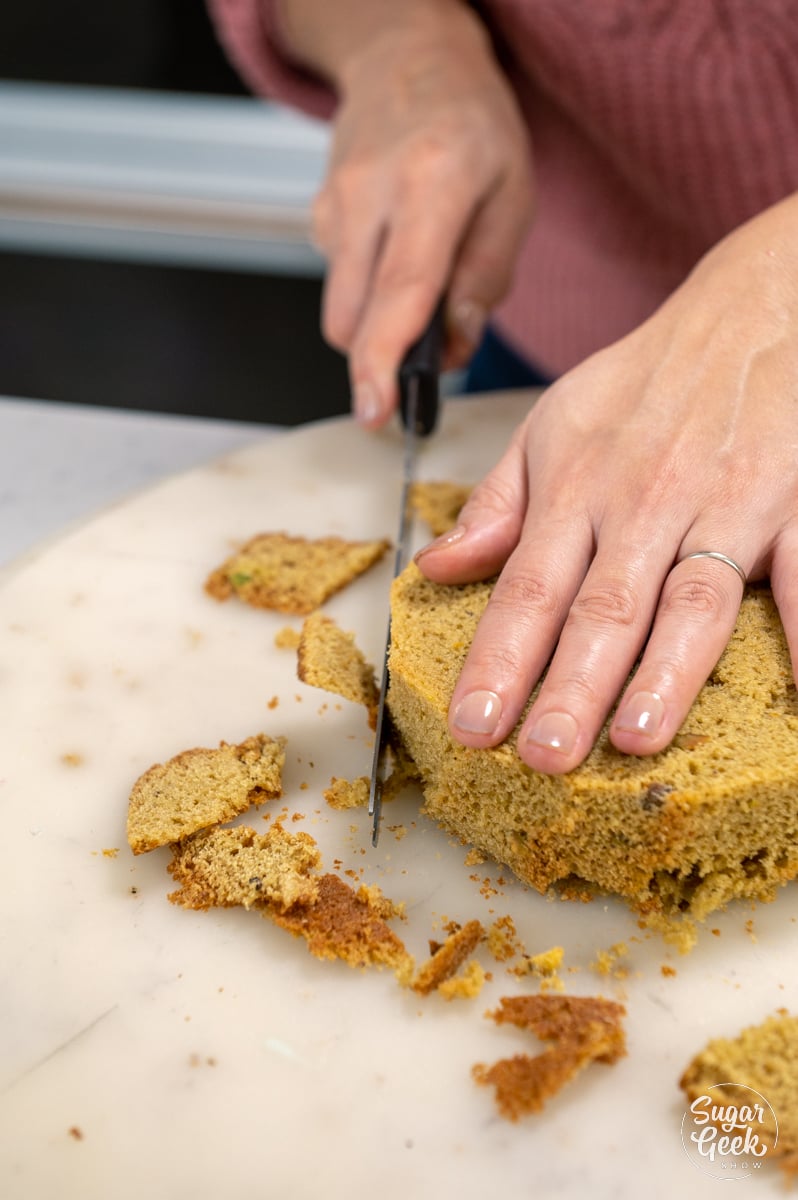 trimming pistachio cake layers