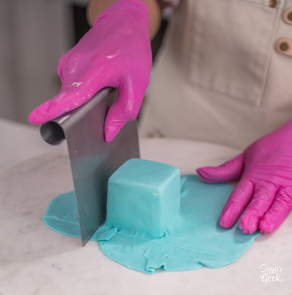 trimming off excess fondant