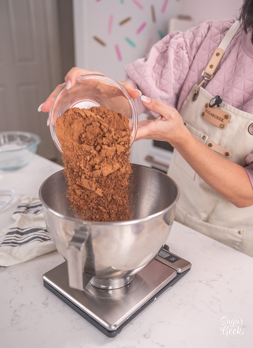 pouring ingredient into mixing bowl