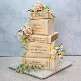 Cakes stacked and sculpted to look like books