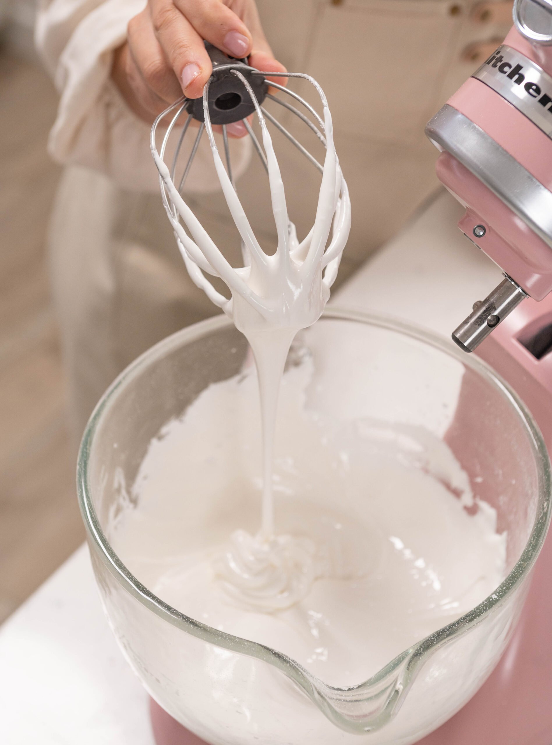 stand mixer bowl filled with meringue
