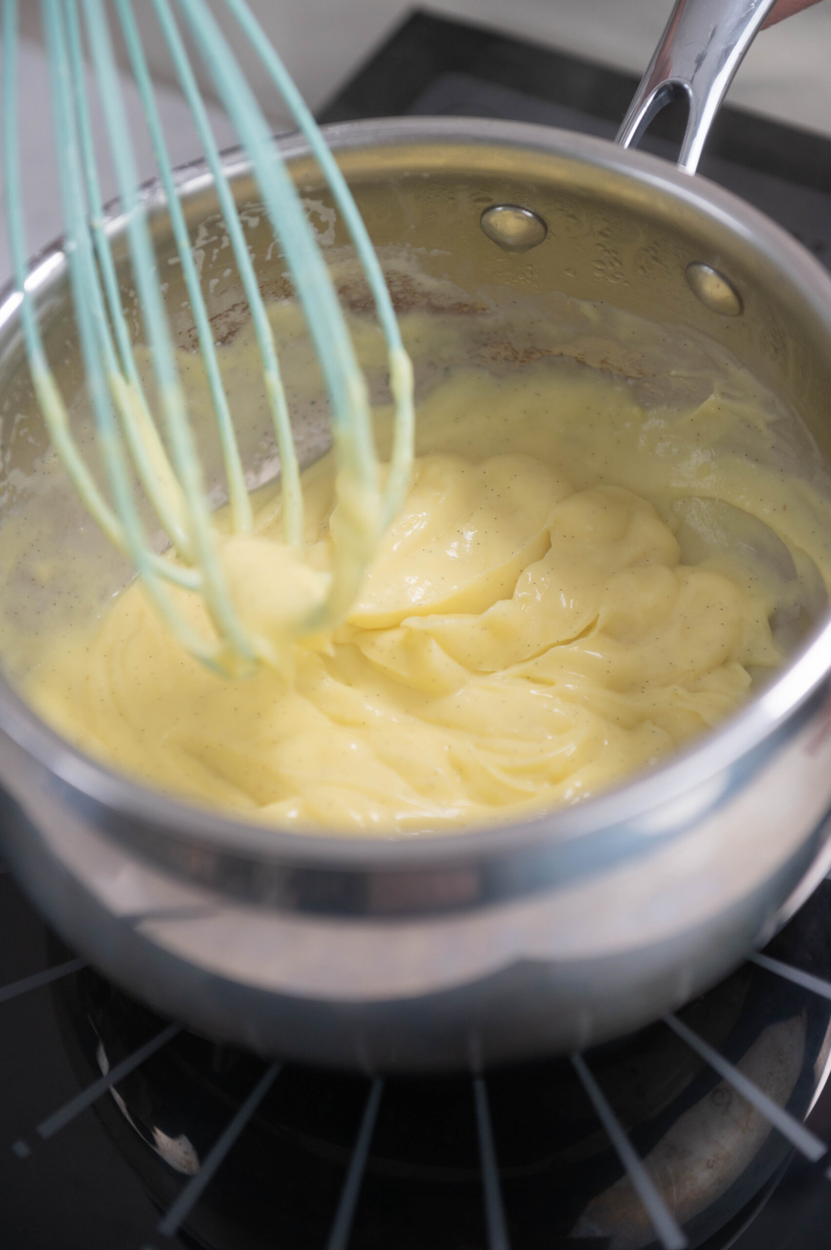 whisk over pot of pastry cream.