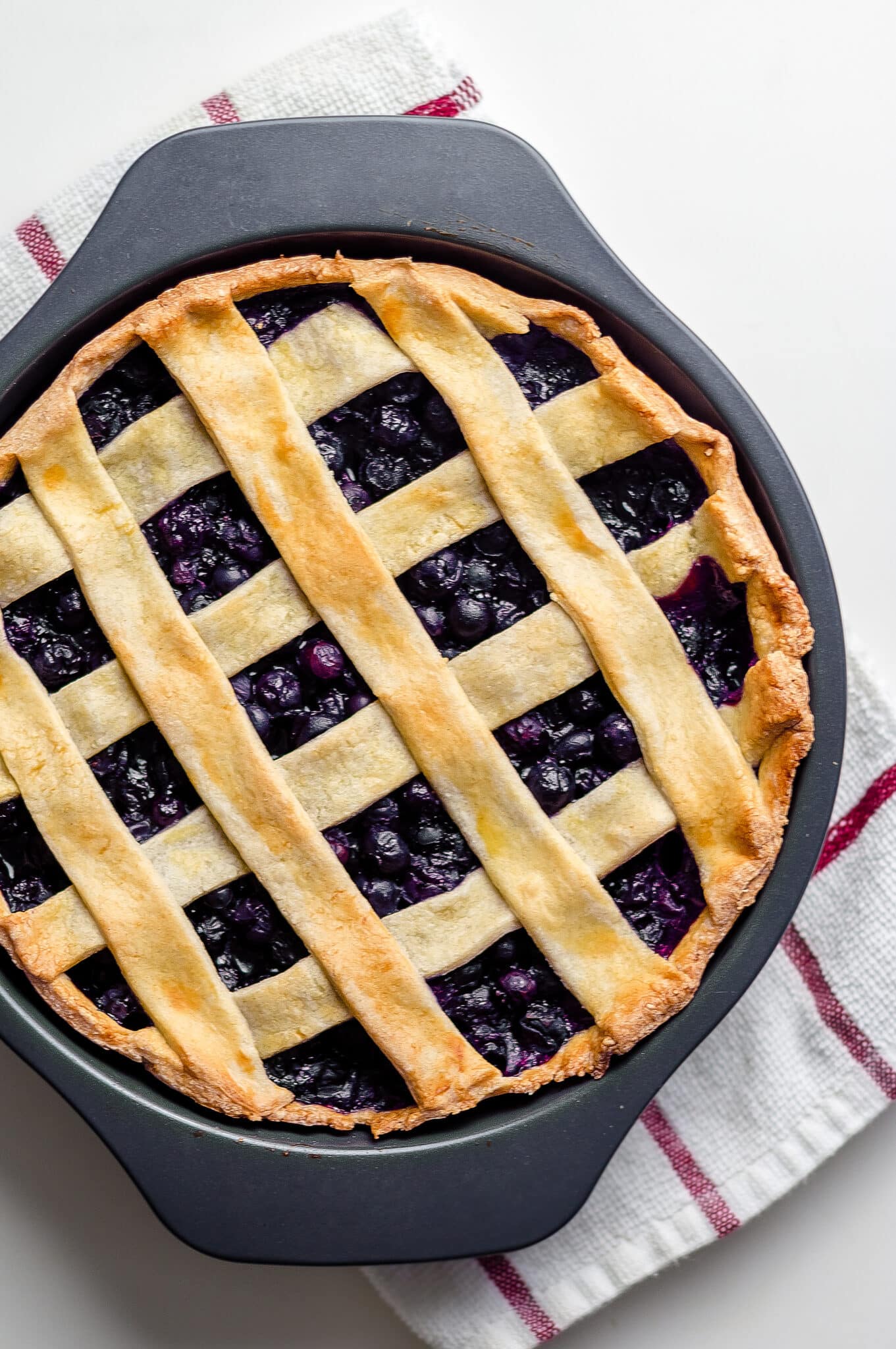 blueberry pie with lattice top.