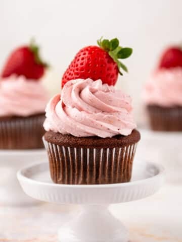 strawberry buttercream on a chocolate cupcake
