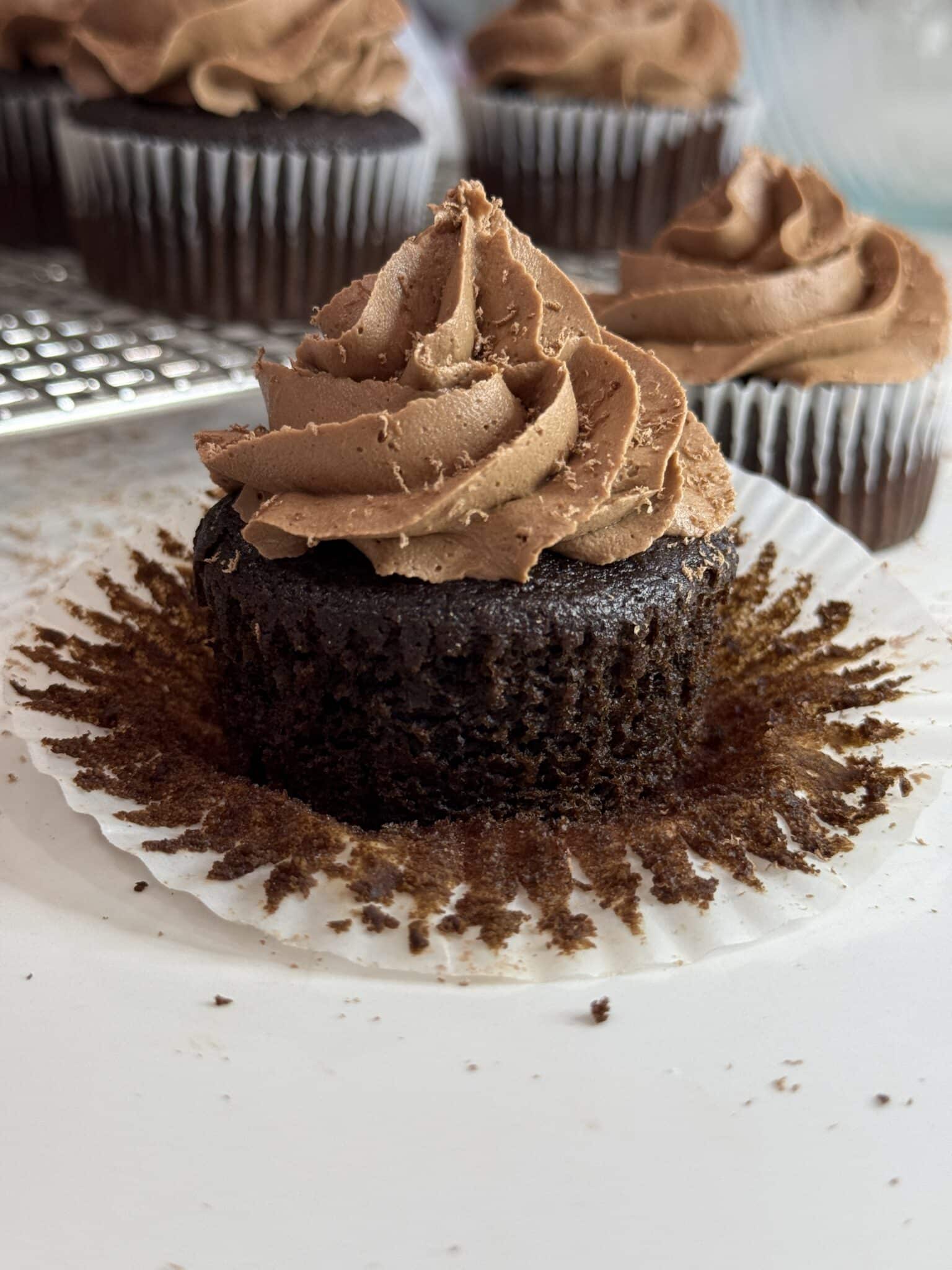 moist chocolate cupcake with the wrapper peeled back