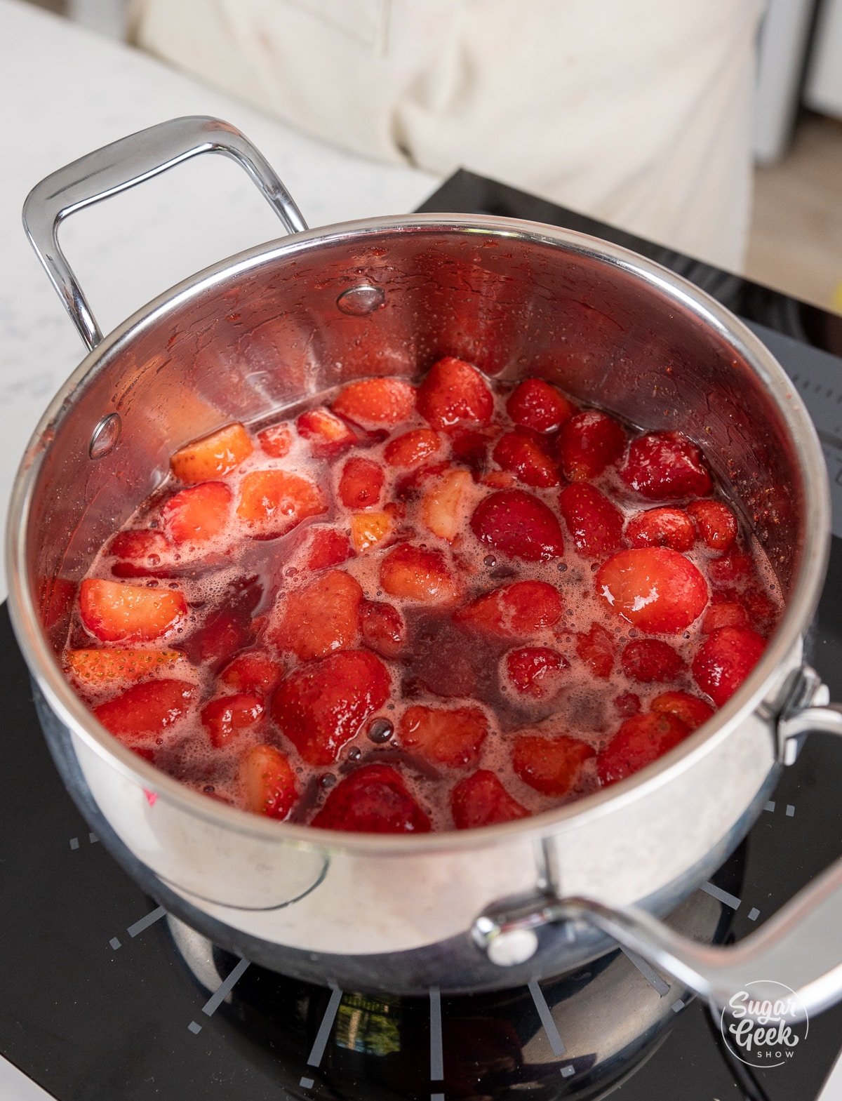 pot of cooking strawberries. 
