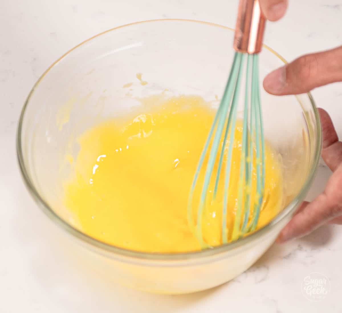 egg, sugar and cornstarch mixture whisked to ribbon texture. 
