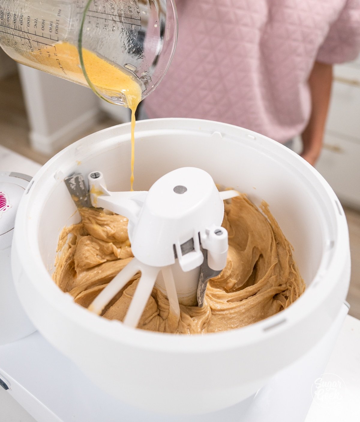 mixing the honey cake batter in the stand mixer. 