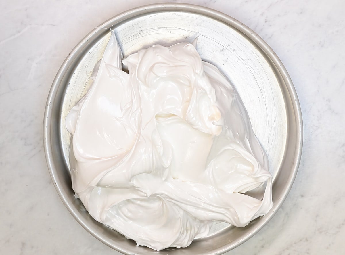 Meringue in a cake pan shot from above.