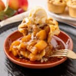 Finished mini apple pie with ice cream.