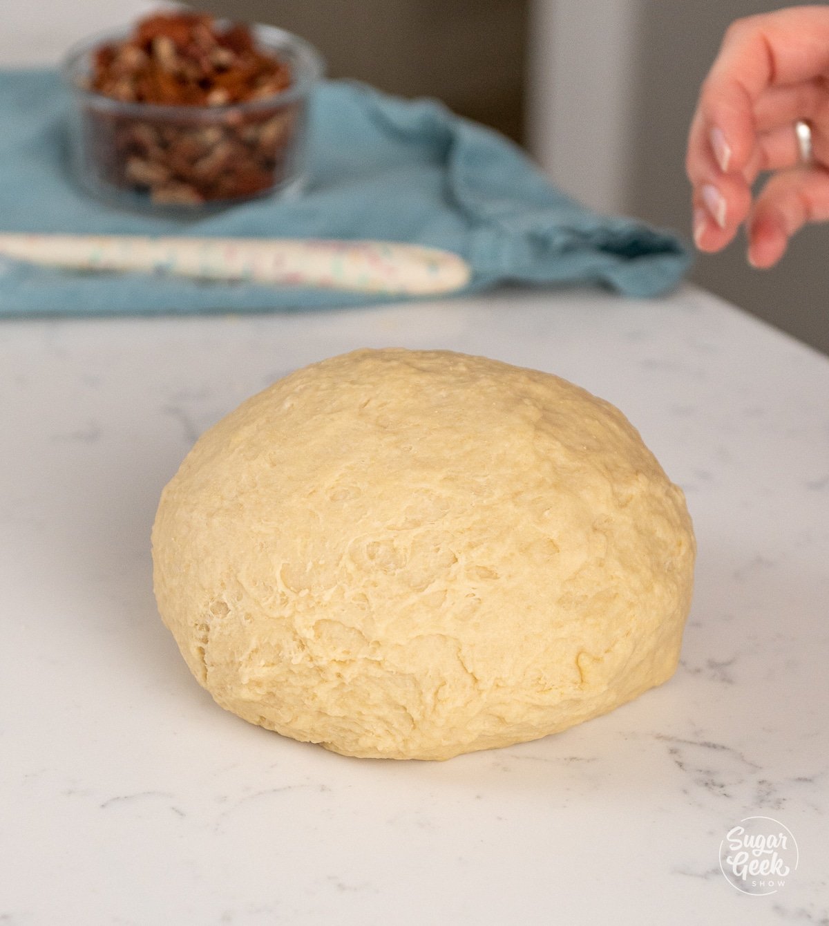 smooth dough ball on a counter top