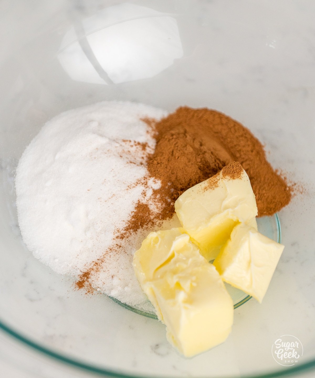 butter, cinnamon, and sugar in a glass bowl