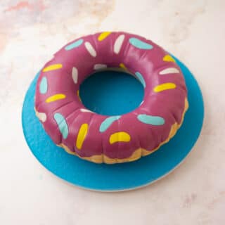 cake sculpted to look like a pool floaty