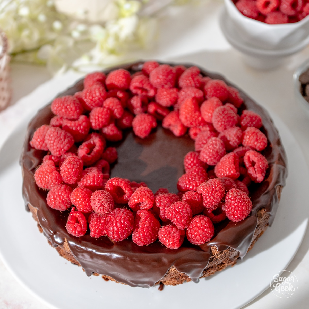 flourless chocolate cake with raspberries on top